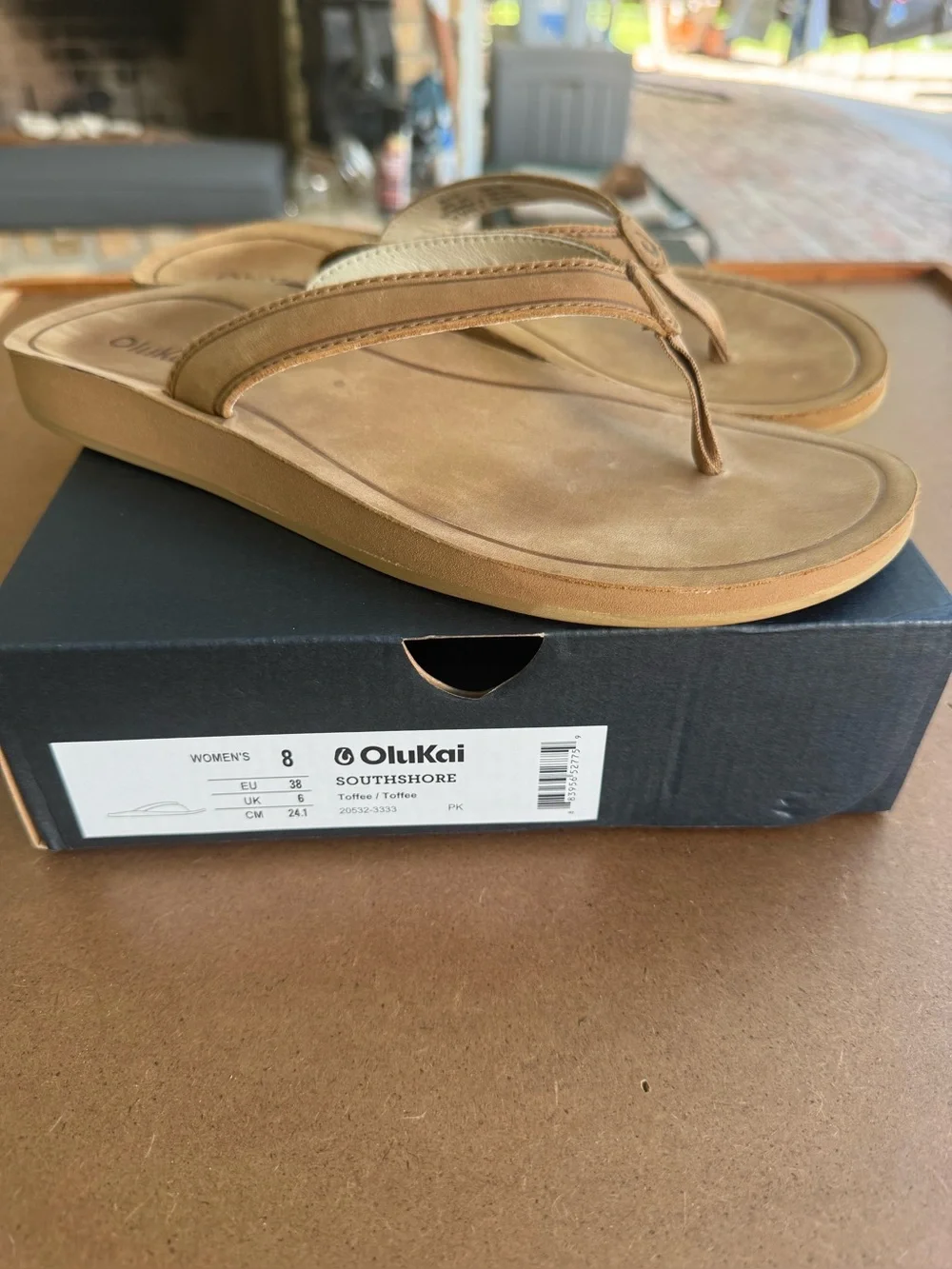 OluKai Southshore Flip Flops in Toffee - Picture 1 of 5